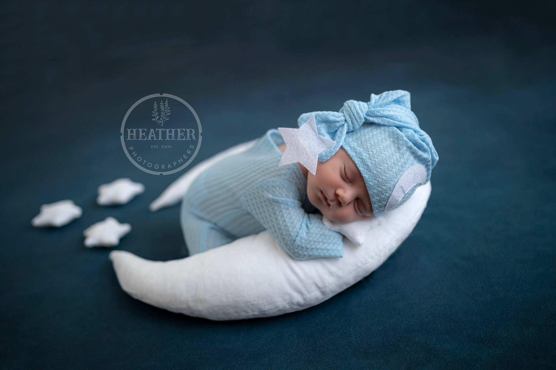 Blue is a timeless choice for baby photography, representing both boys and girls