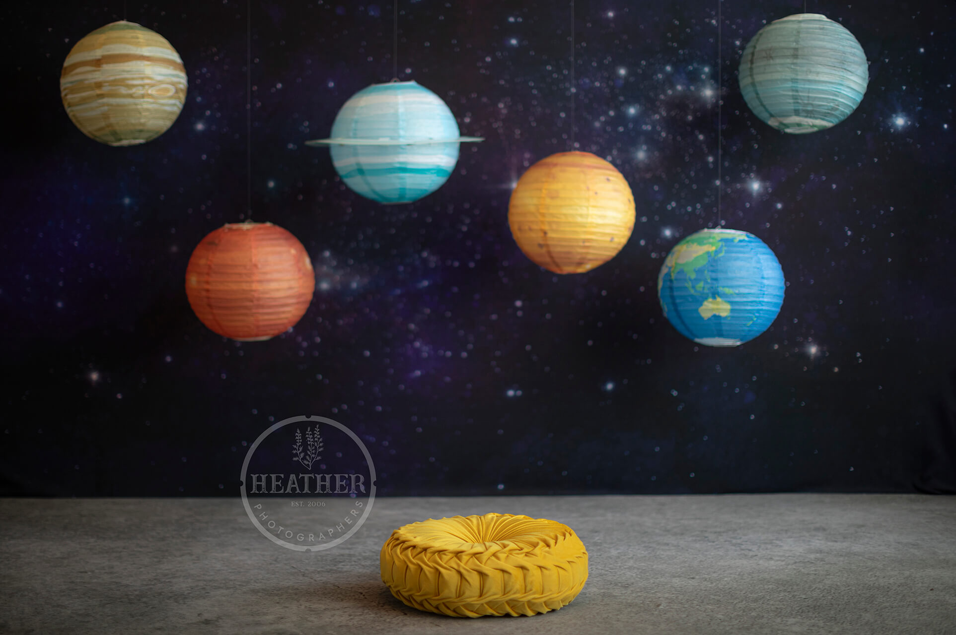 A dramatic backdrop showcasing planets, stars, and galaxies